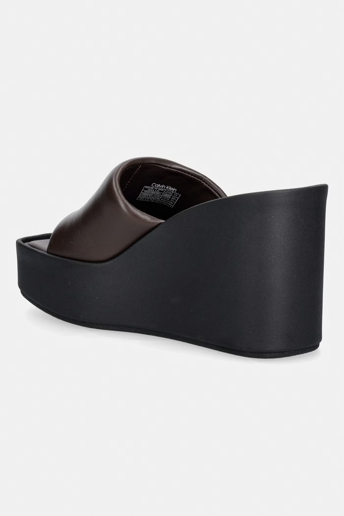 Obuwie Calvin Klein klapki na koturnie damskie skórzane WEDGE 70 SNDL MULE LTH HW0HW02881 brązowy