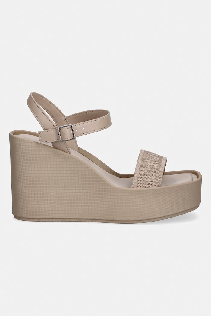 Calvin Klein sandále na platforme po celej dĺžke WEDGE 70 SNDL WEBBING LTH HW0HW02882 béžová SS26