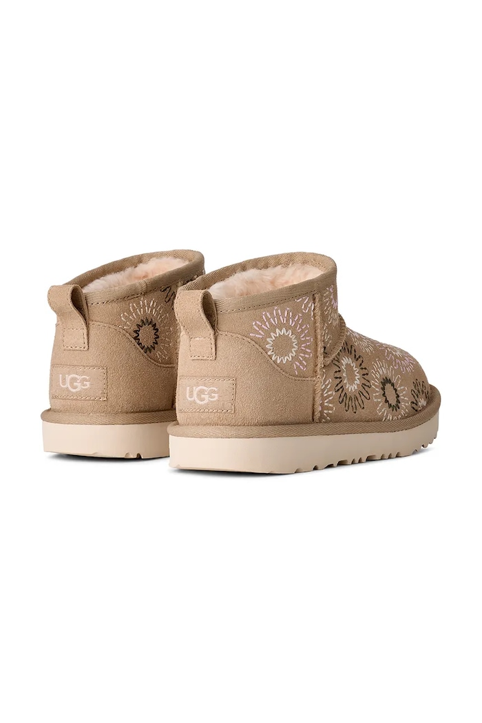 Dziewczynka UGG buty zimowe zamszowe dziecięce KIDS' CLASSIC ULTRA MINI SUN STITCH 1175211K beżowy
