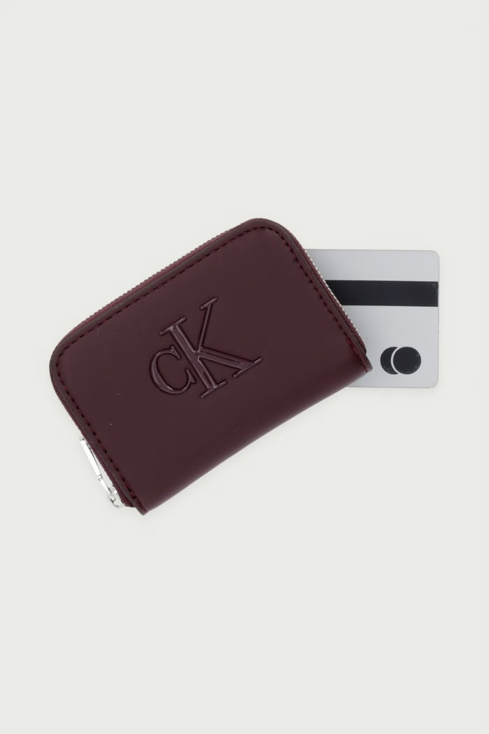 Portfel damski z imitacji skóry Calvin Klein LV04F1154G fioletowy