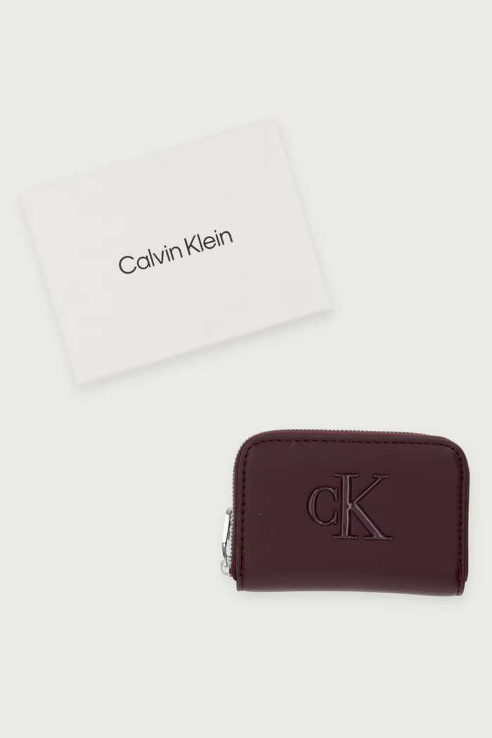 Portfel damski z imitacji skóry Calvin Klein fioletowy LV04F1154G