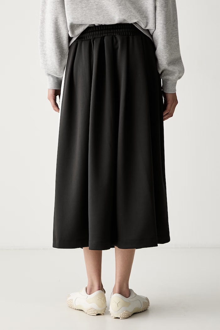 Odzież Puma spódnica rozkloszowana T7 Midi 634622 czarny
