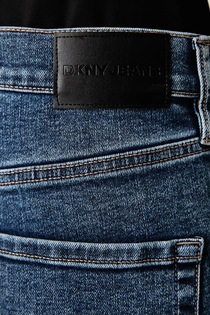 Jeansy flare damskie DKNY DJ5M4005 niebieski