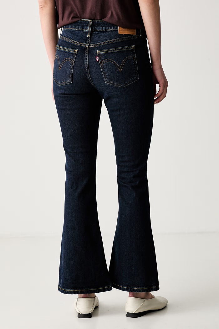 Odzież Levi's jeansy bootcut damskie LOW SLIM BOOT 006KC granatowy