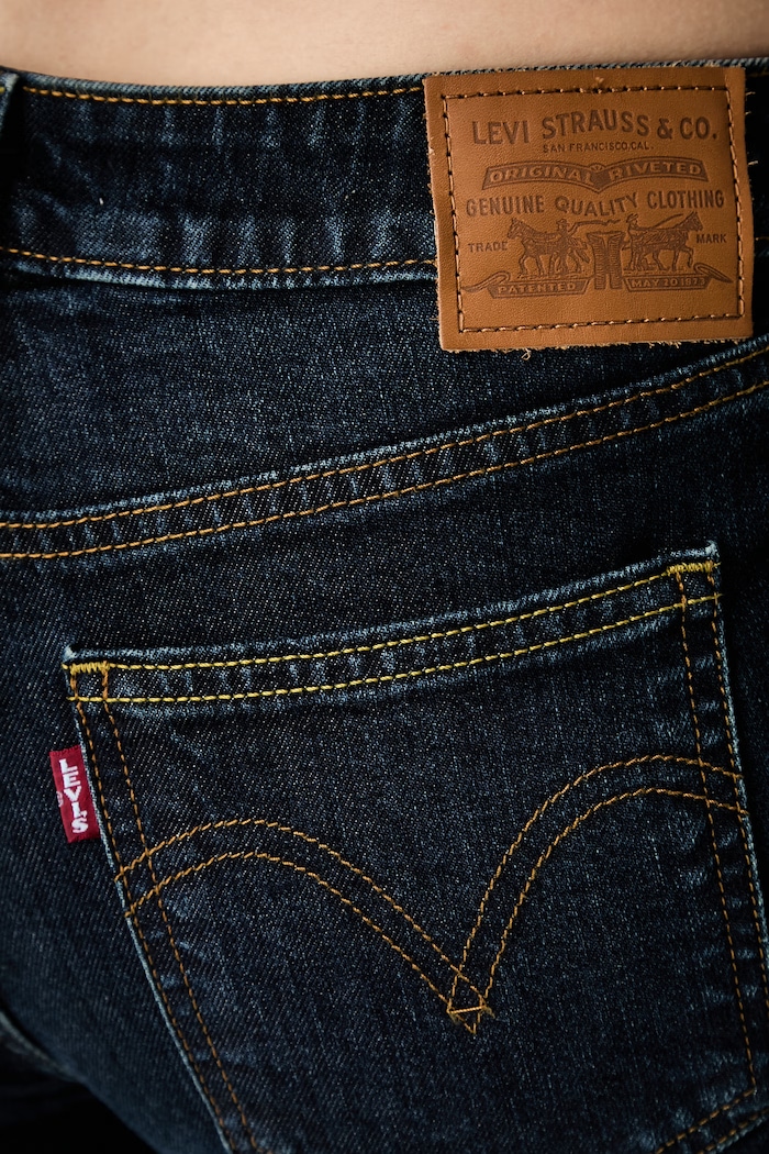 Levi's jeansy bootcut damskie LOW SLIM BOOT granatowy 006KC