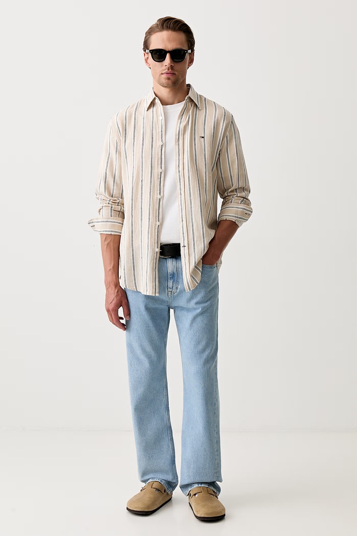 Tommy Jeans jeansy regular męskie DM0DM23060 niebieski SS26
