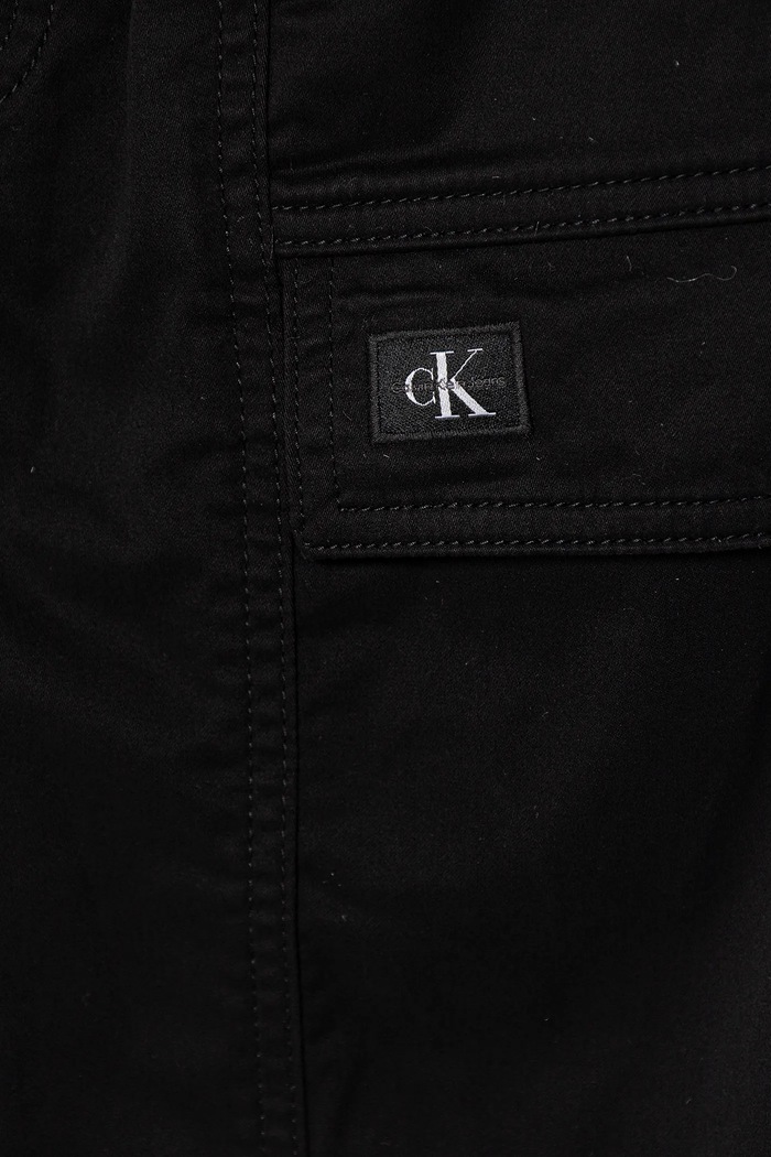 Chlapec Nohavice Calvin Klein Jeans IB0IB02603.128.176.PPY2 čierna