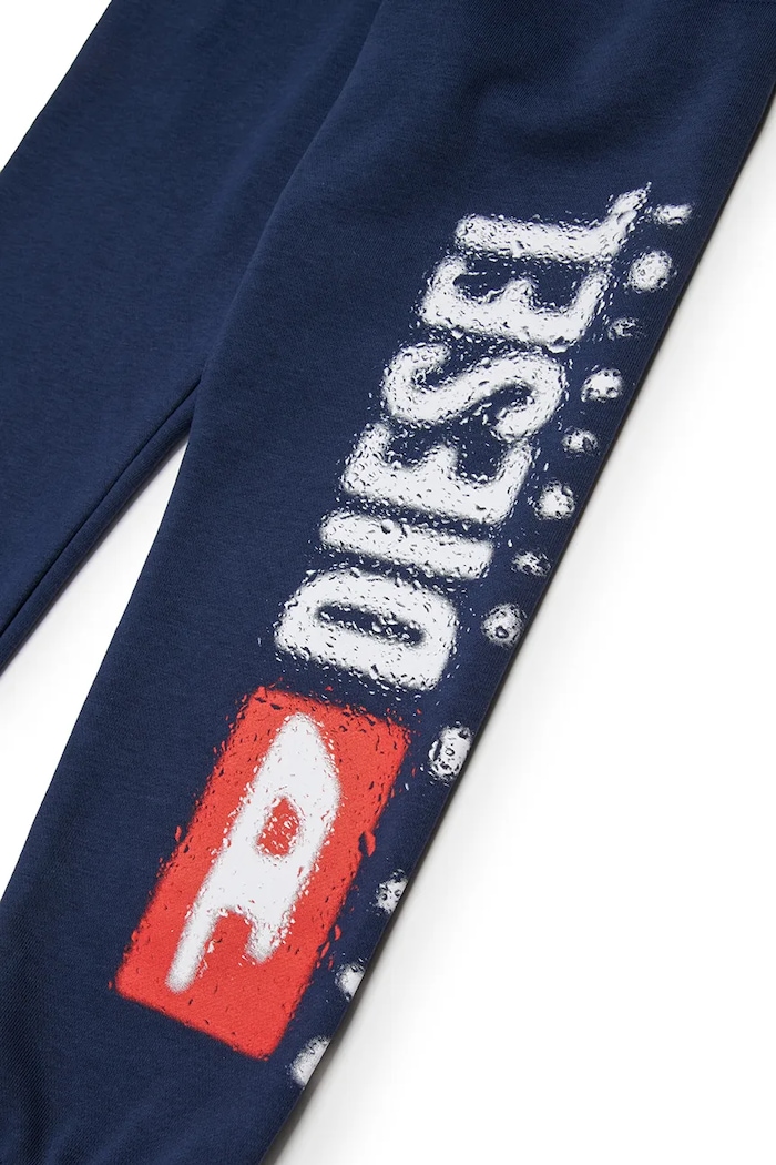 Diesel spodnie dresowe bawełniane dziecięce PANTLI TROUSERS granatowy J02445.KYAZ3