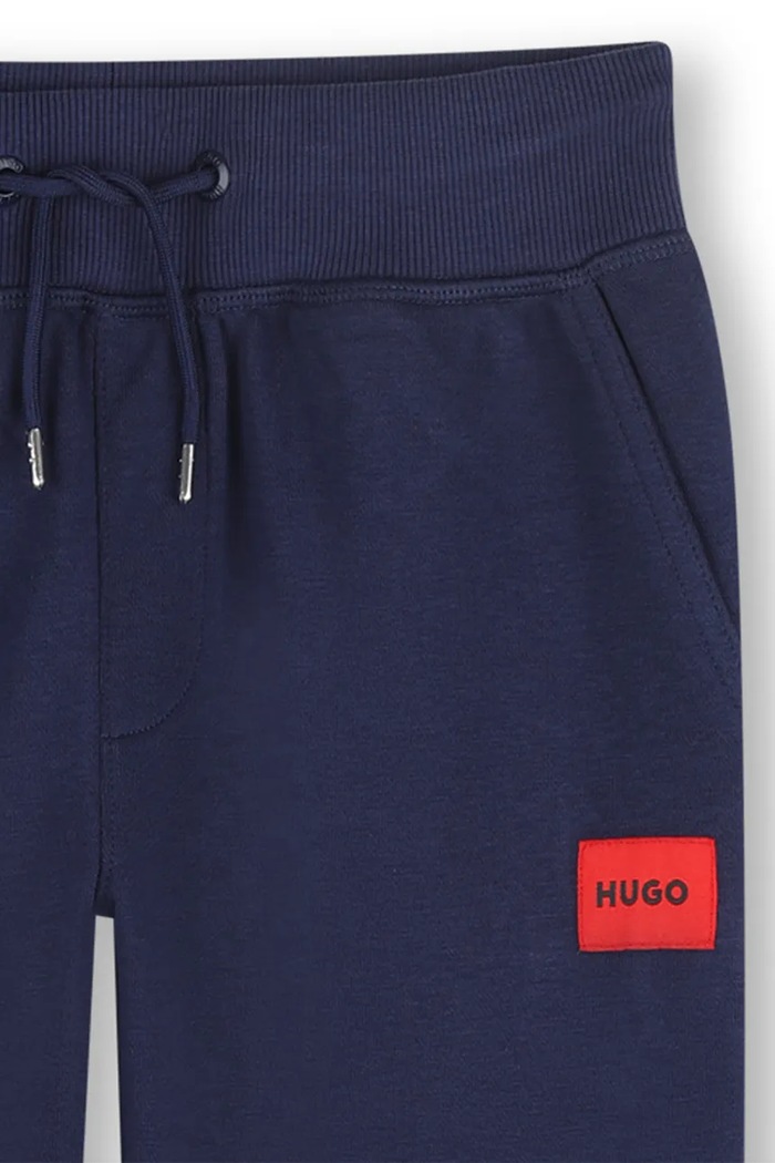 Chlapec Detské tepláky HUGO G01182.162.174 tmavomodrá