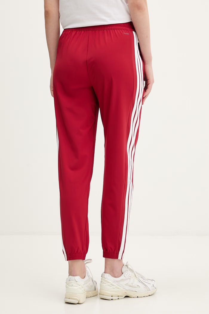 Oblečenie Tepláky adidas Performance KF8554 červená
