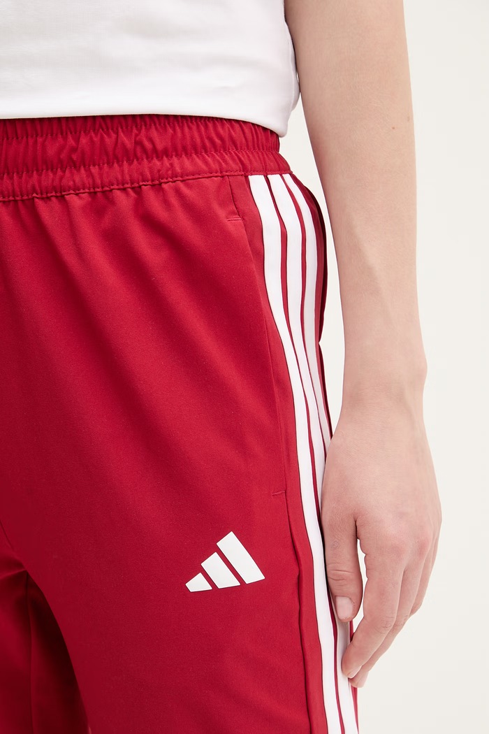 Tepláky adidas Performance červená KF8554