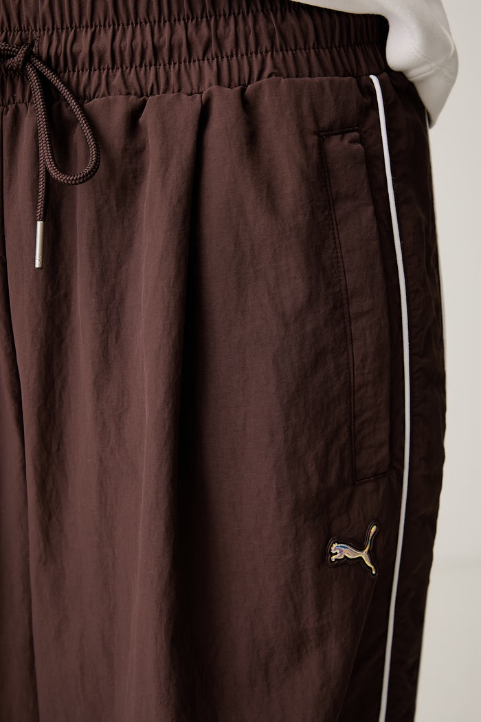 Puma teplákové nohavice dámske Piping Relaxed Woven 634559 hnedá