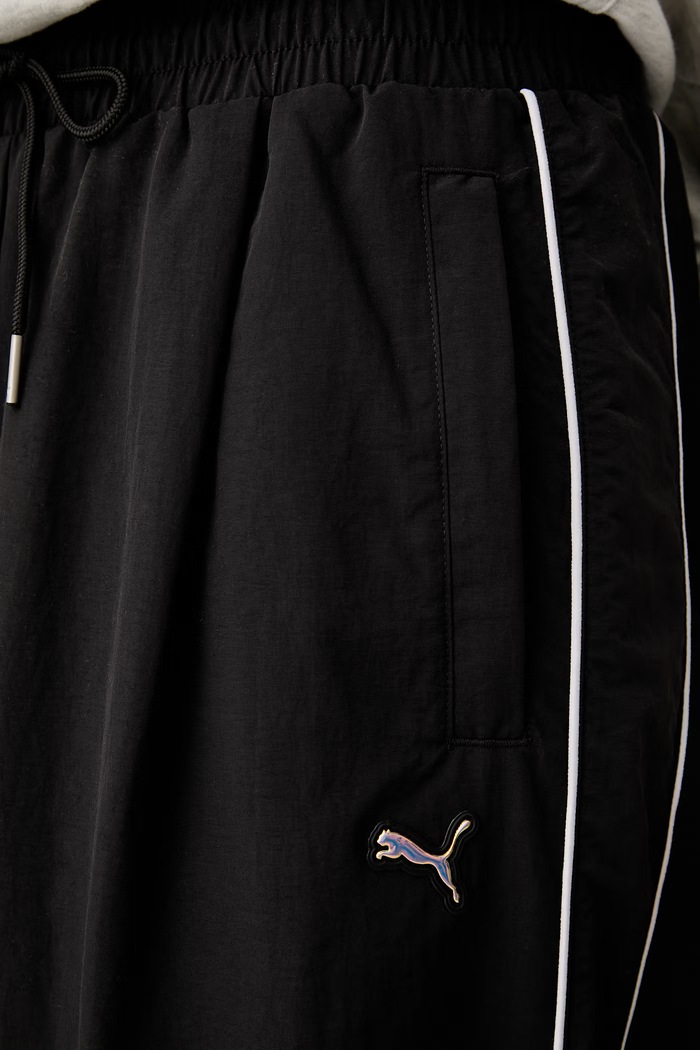 Puma teplákové nohavice dámske Piping Relaxed Woven 634559 čierna
