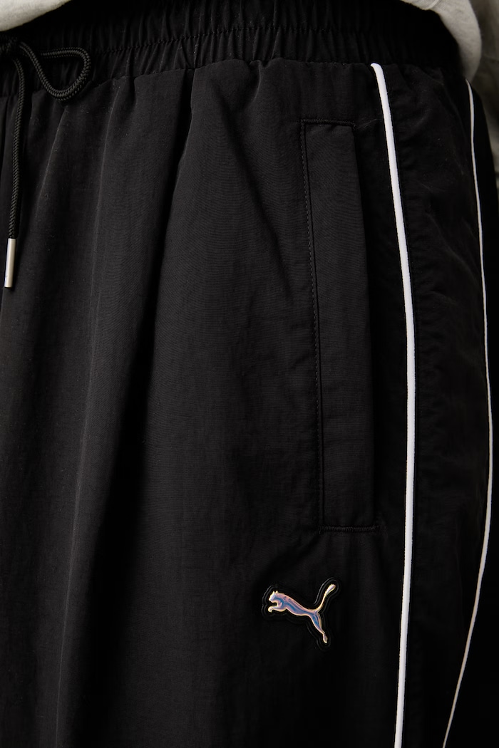 Puma teplákové nohavice dámske Piping Relaxed Woven 634559 čierna