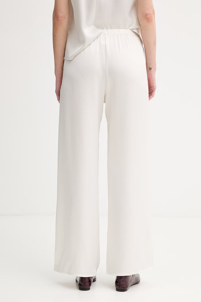 Oblečenie Calvin Klein nohavice dámske LV044F611G béžová