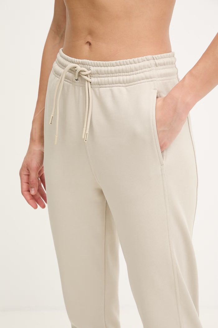 adidas by Stella McCartney spodnie dresowe damskie bawełniane beżowy JZ0658