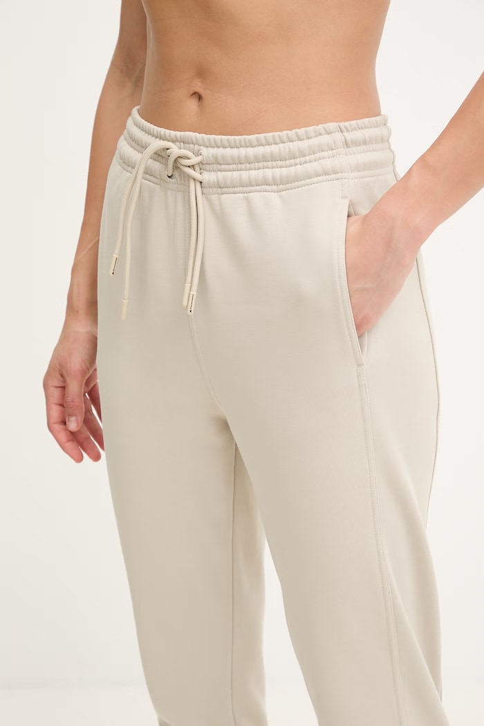 adidas by Stella McCartney spodnie dresowe damskie bawełniane beżowy JZ0658