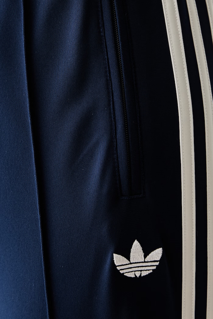 adidas Originals dámske teplákové nohavice tmavomodrá KC9018