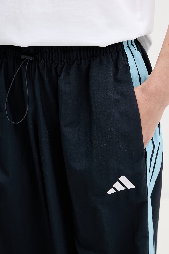 Adidas pantaloni de trening pentru femei bleumarin KD9449