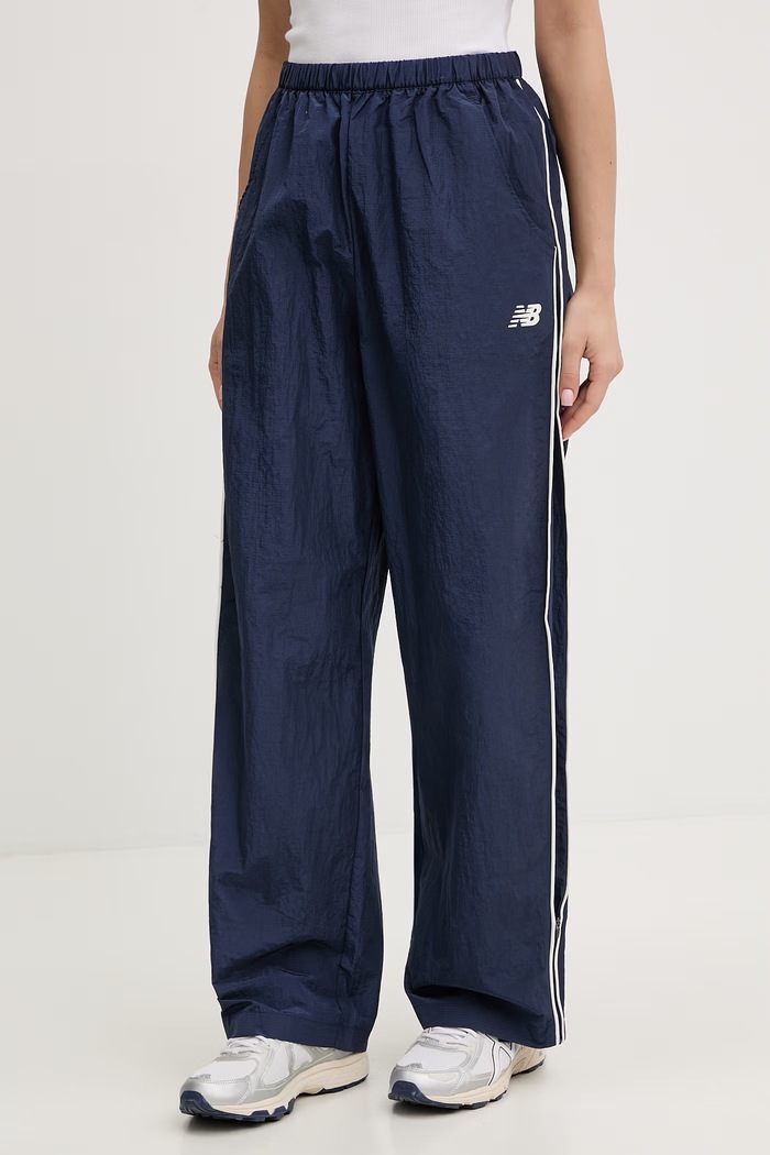 New Balance teplákové nohavice dámske Sport tmavomodrá WB61Z1E6NNY