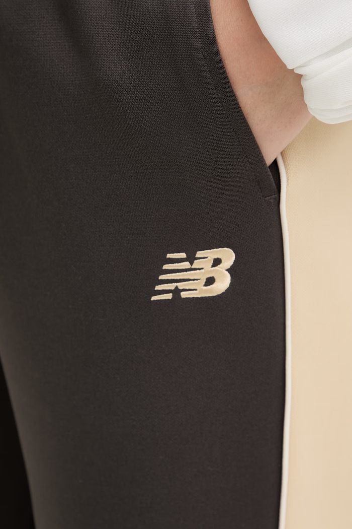 New Balance dámske tepláky Interlock WB61Q2R4ABR sivá