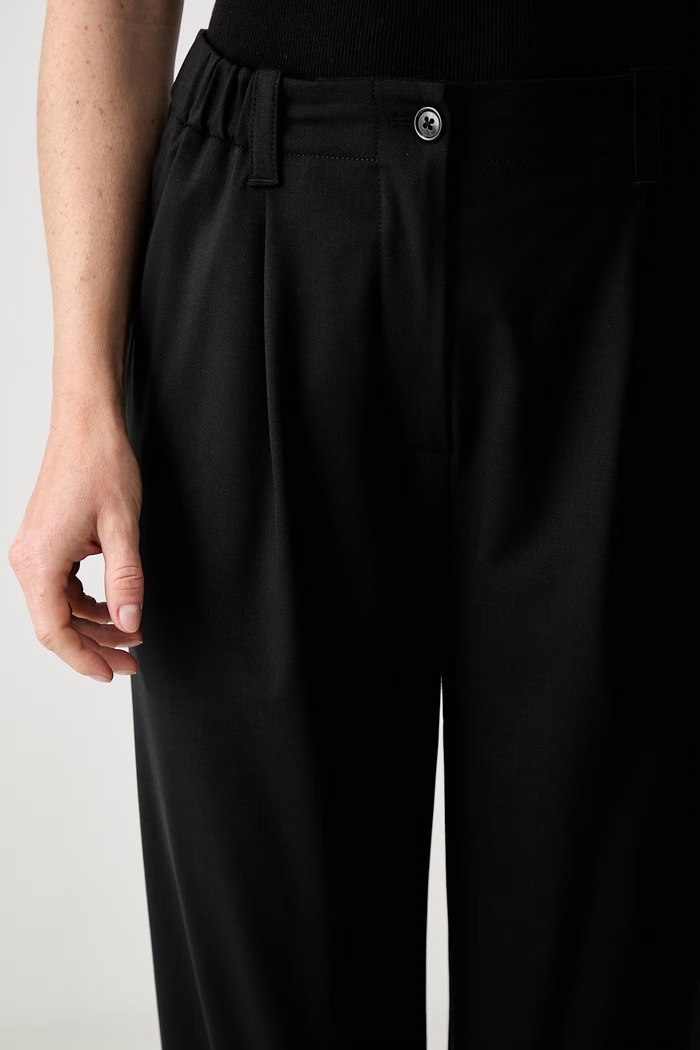 Kenzo spodnie z dodatkiem wełny Jog Pants czarny FF52UP0779RU