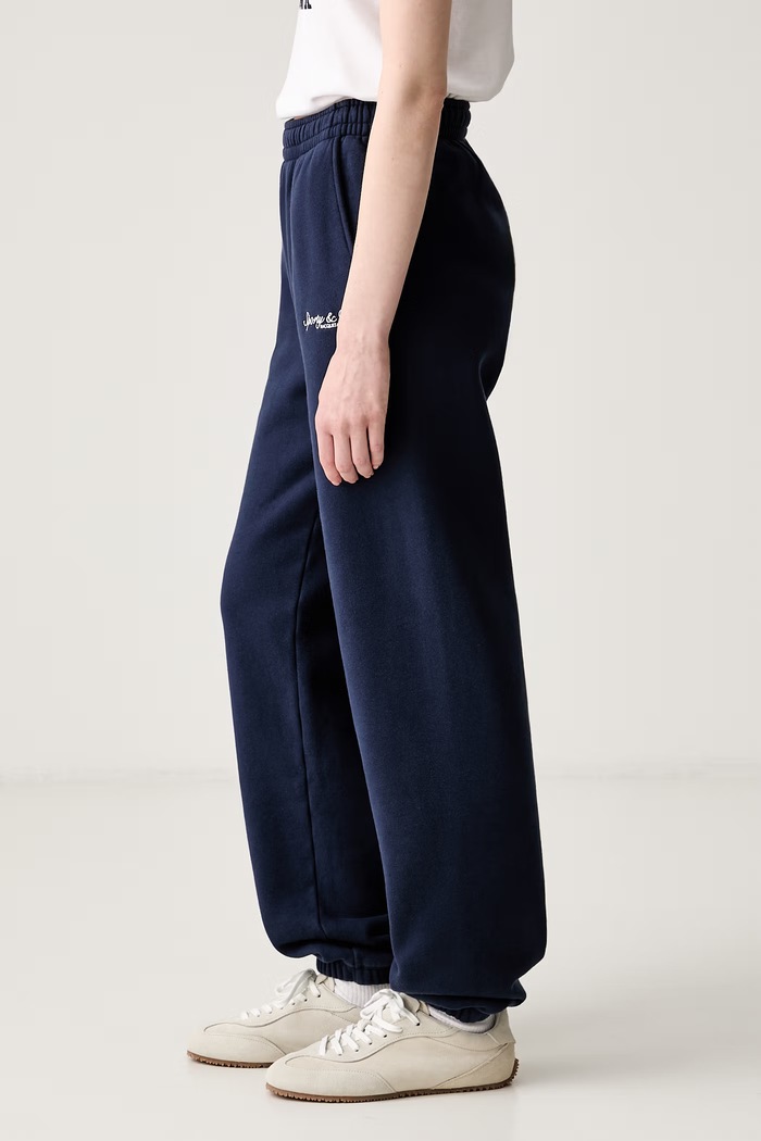 Sporty & Rich Syracuse spodnie dresowe bawełniane damskie PA07075325BL106 granatowy SS26