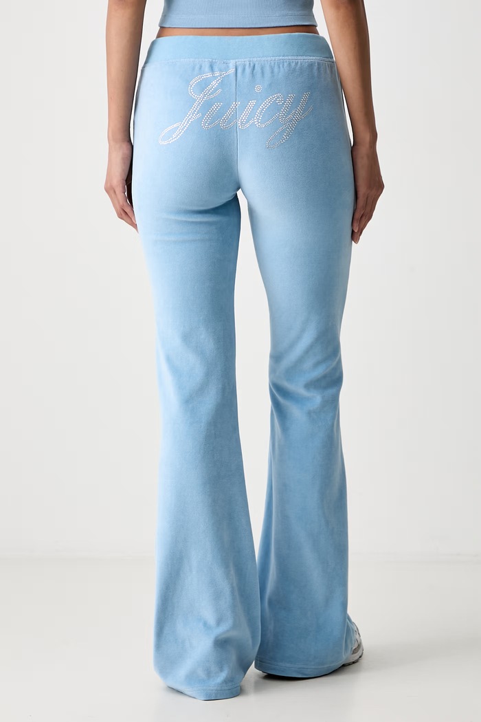 Odzież Sporty & Rich x Juicy Couture spodnie dresowe welurowe damskie PA067716689BL50 niebieski