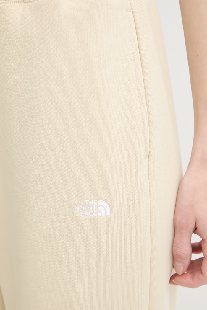 The North Face pantaloni de trening pentru femei din bumbac Essential Terry Simple Dome bej NF0A8GQZDOM1
