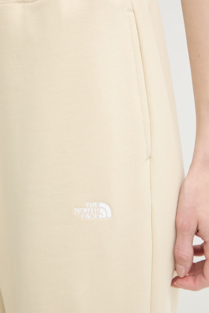 The North Face pantaloni de trening pentru femei din bumbac Essential Terry Simple Dome bej NF0A8GQZDOM1