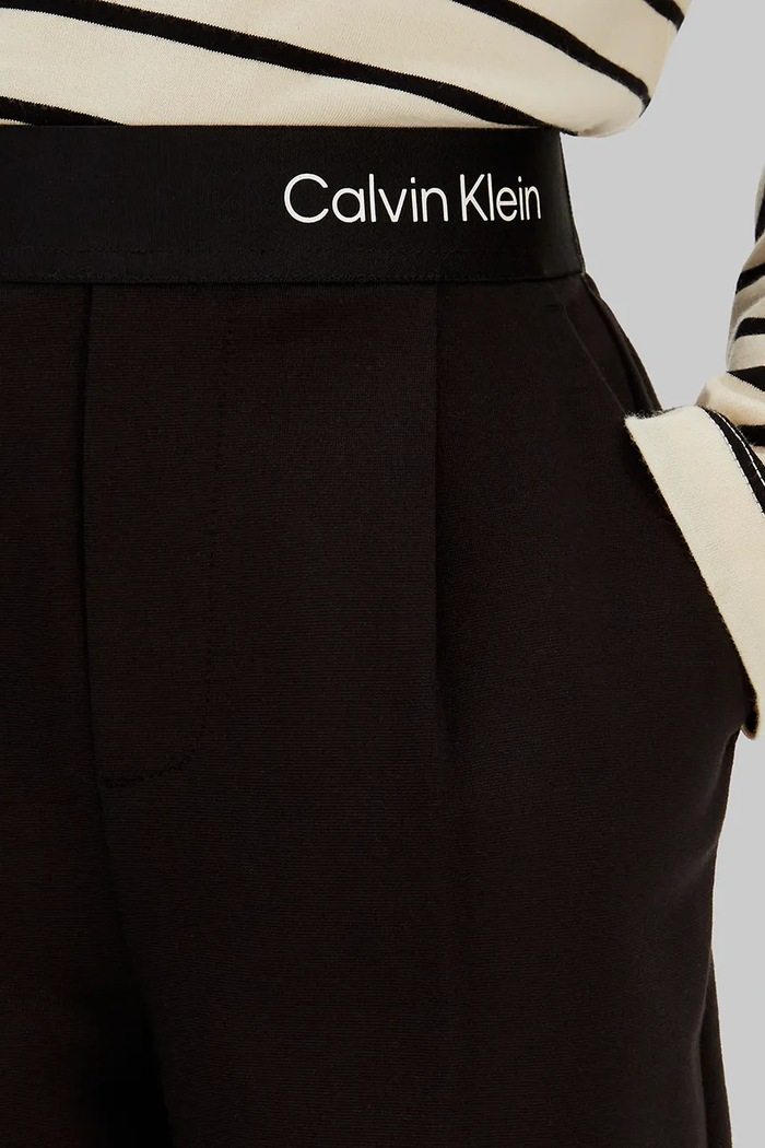 Dětské kalhoty Calvin Klein Jeans černá IG0IG03091.128.176.PPY2