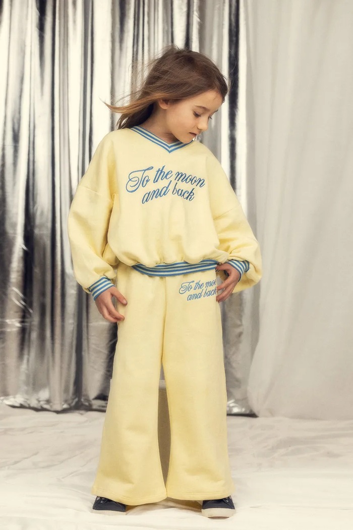 Mini Rodini pantaloni de trening pentru copii din bumbac To the moon galben 26230141