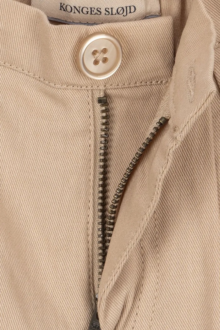 Detské bavlnené nohavice Konges Sløjd FRANKIE PANTS GOTS béžová KS104301.PreSpring