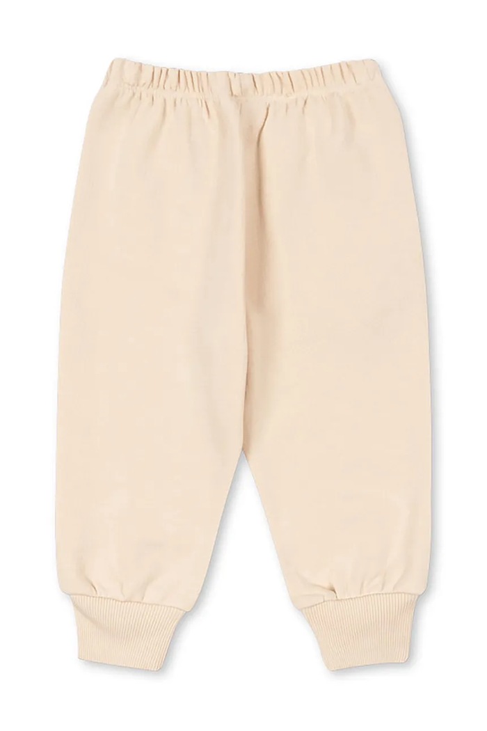 Konges Sløjd spodnie dresowe bawełniane dziecięce LOUPY LOU SWEAT PANTS OCS KS104349.PreSpring beżowy SS26