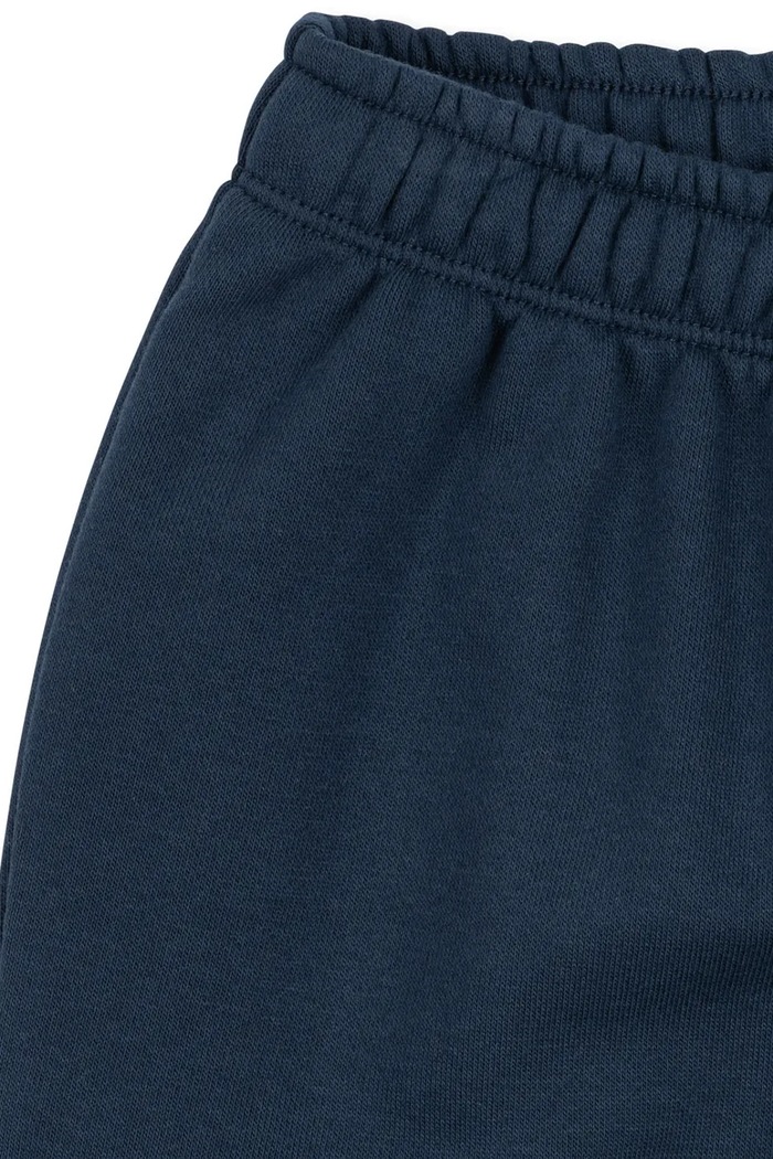 CHLAPEC Dětské tepláky Konges Sløjd LOU SWEAT PANTS OCS KS104942.PPY2 námořnická modř