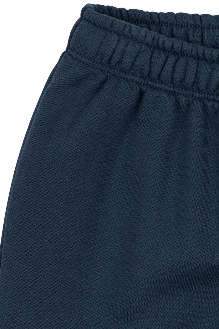 CHLAPEC Dětské tepláky Konges Sløjd LOU SWEAT PANTS OCS KS104942.PPY2 námořnická modř