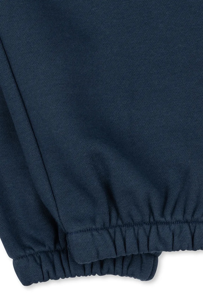 Dětské tepláky Konges Sløjd LOU SWEAT PANTS OCS námořnická modř KS104942.PPY2