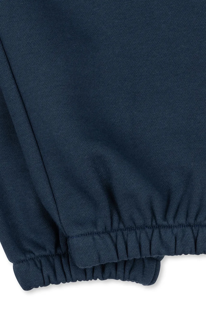 Dětské tepláky Konges Sløjd LOU SWEAT PANTS OCS námořnická modř KS104942.PPY2