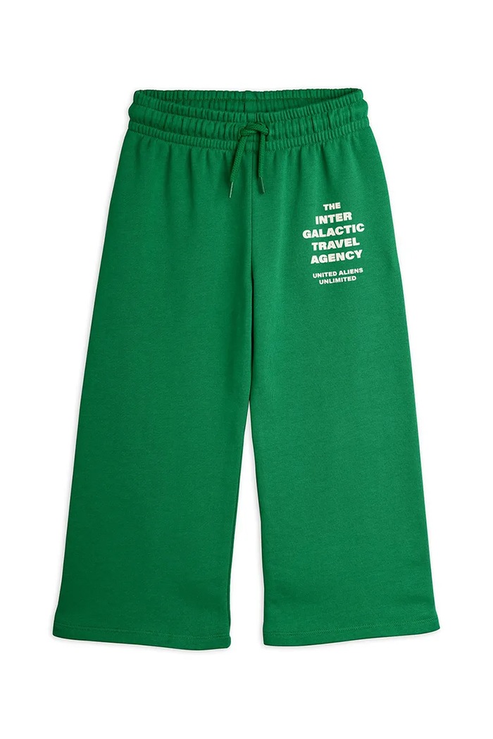 Mini Rodini pantaloni de trening din bumbac pentru copii Travel agency 26230144 verde SS26