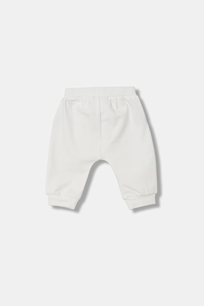 United Colors of Benetton detské teplákové nohavice z bavlny s elastanom 35FNAF02K.W.Stagionale biela SS26
