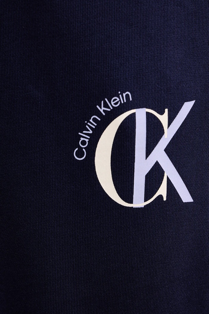 Βαμβακερό παντελόνι Calvin Klein Jeans σκούρο μπλε LV04RE256G