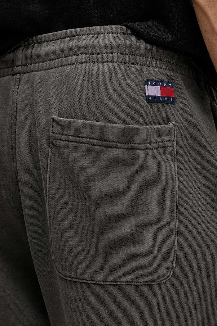 Bavlněné tepláky Tommy Jeans šedá DM0DM22360