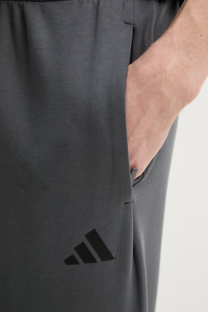Tepláky adidas sivá KD5210