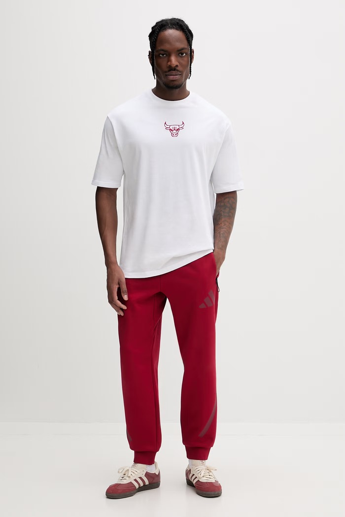 Adidas Teplákové nohavice pánske s bavlnou Z.N.E KE4685 červená SS26