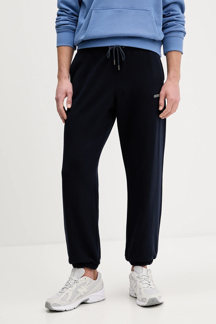 Bavlnené tepláky Guess Jeans nášivka tmavomodrá M6RB70.KCPR1