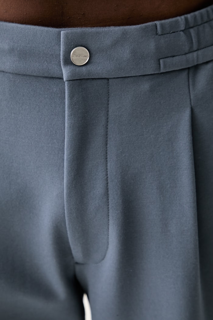 Calvin Klein spodnie męskie z wiskozą niebieski LV04LF607G