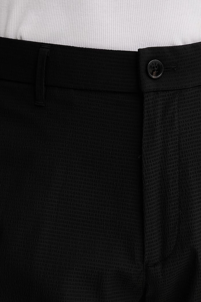 Calvin Klein nohavice chinos pánske čierna LV04LF609G