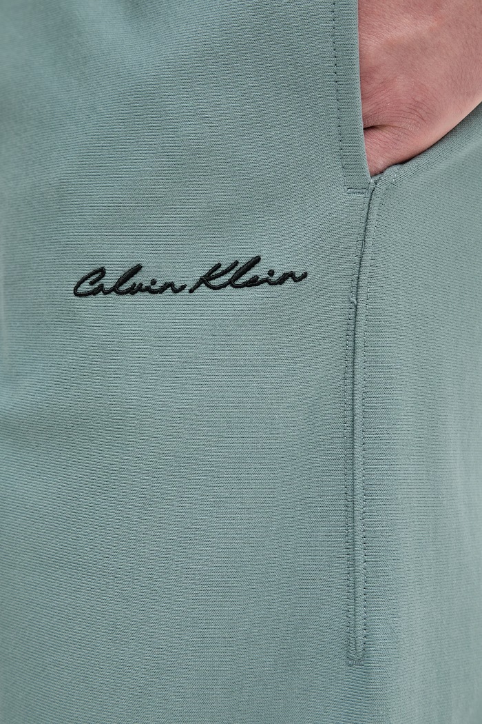 Calvin Klein Jeans pantaloni de trening pentru bărbați verde LV04RF249G