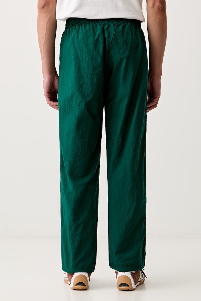 Oblačila adidas Originals ravne hlače moške TRACK PANT KE0870 zelena