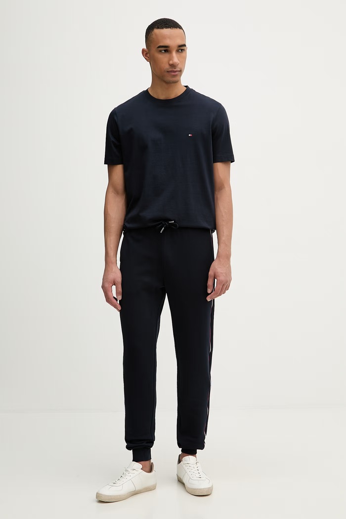 Tommy Hilfiger teplákové nohavice pánske bavlnené MW0MW42882 tmavomodrá SS26